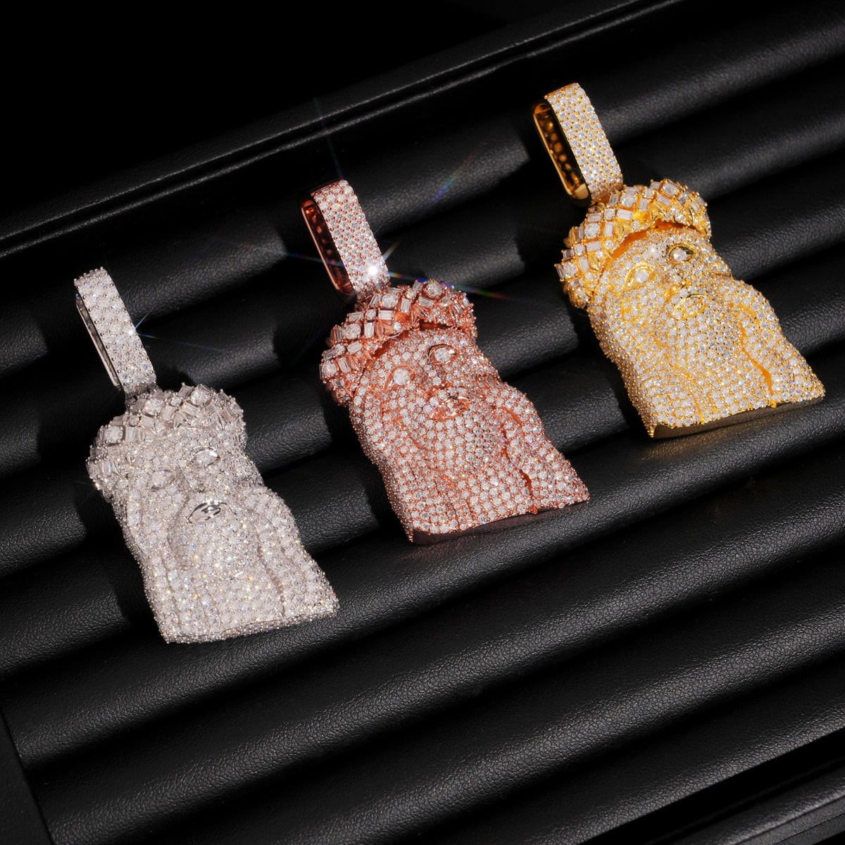 Moissanite Jesus Piece pendants in white gold, rose gold, and yellow gold